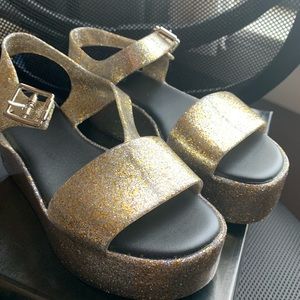 Melissa Brand new with box. Champagne Glitter.